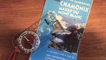 A map and compass on a self-guided Tour du Mont Blanc walking holiday